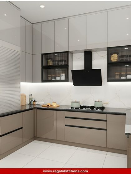 This L-shaped kitchen features a glossy, light brown finish and a black countertop for a sleek, modern look. We included fluted glass cabinets and under-cabinet lighting to add visual interest and functionality.