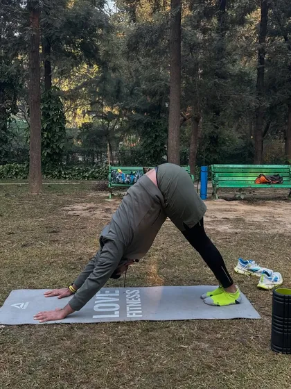 Me demonstrating the downward dog pose, a fantastic stretch for the entire posterior chain.