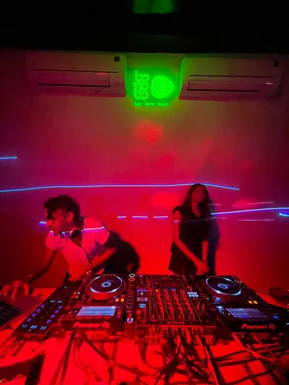 A wide shot of the DJ booth during our B2B set. Two DJs, double the classics.