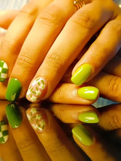 Another view of the fun green checkerboard and floral nail art.