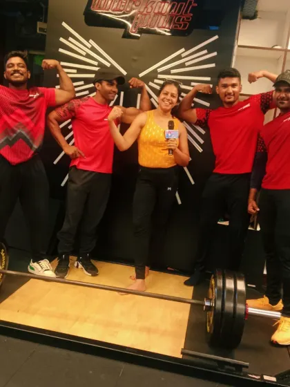 Hosting a fitness challenge at Workout Plus gym. I love the raw energy of strength competitions and enjoy celebrating the power and dedication of the athletes.