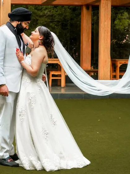 Capturing the magic in simplicity. We love using elements like a bride's veil to create soft, romantic, and timeless portraits that feel both elegant and natural. This shot was taken in a beautiful resort corridor in Bangalore.