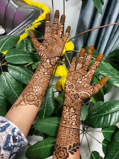 Another angle of this detailed party henna, showing the beautiful flow of the design.
