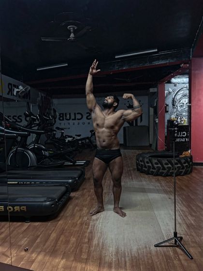 My favorite classic pose. This is a tribute to the golden era of bodybuilding. It requires balance, flexibility, and a well-proportioned physique.