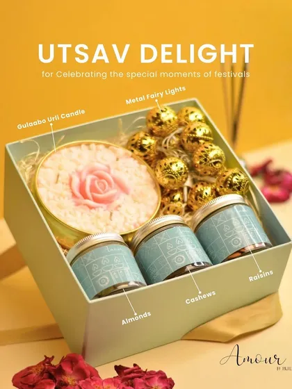 Meet the Utsav Delight Gift Box, curated for celebrating life's special moments. It includes my Gulaabo Urli Candle, premium dry fruits in chic jars, and metal fairy lights to add that extra sparkle. It’s elegance and celebration, all packed with love.