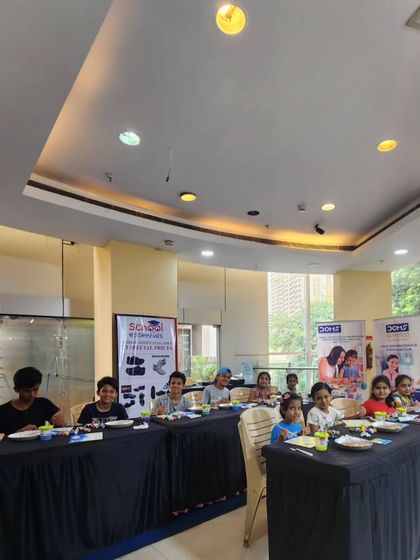 A classroom setting for one of our workshops, with students ready to begin their art projects. We ensure a comfortable and inspiring environment for learning.