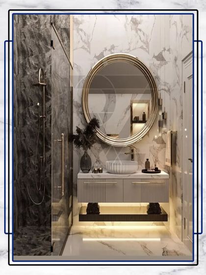 An inspiration image showing a highly modern and luxurious bathroom design with a floating vanity, a large round mirror, and a walk-in shower with black marble.