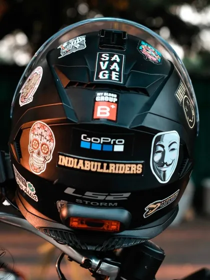 The details tell the real story. This close up of a rider's helmet, covered in stickers from various groups and rides, says more about the community and lifestyle than a wider shot ever could. I focus on these small elements to add depth to brand stories.