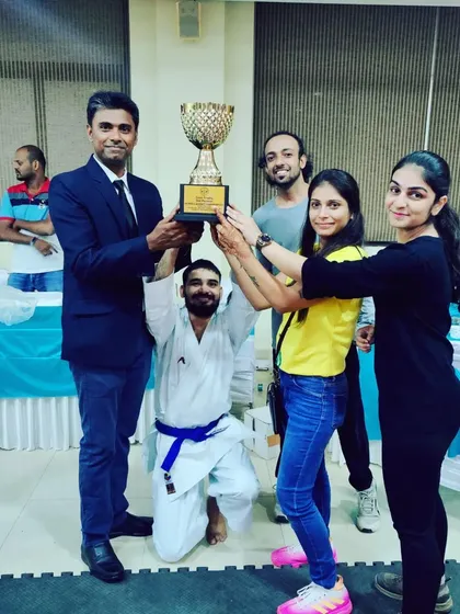 Our team celebrating a big win with the championship trophy. Success is a team effort, and I am proud of every person who contributed to this victory.