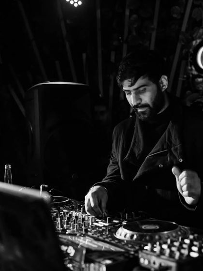 A black and white shot from a wild night at Casa Danza. The focus is always on the music and the mix.