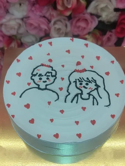 Simple, cute, and full of love. This minimalist drawing cake is a great way to celebrate your relationship. I can personalize these designs to capture your unique story, making it a sweet and memorable centerpiece for your special day.