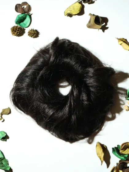 Life is short, buy more scrunchies. This is my messy bun scrunchie, made from real hair for a completely natural look.