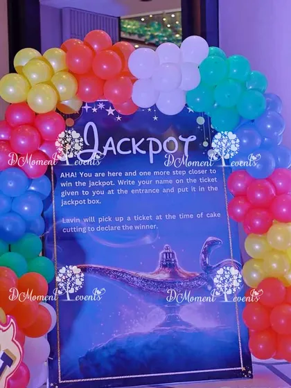 An interactive "Jackpot" sign for a Disney-themed party, adding a fun game element for guests.