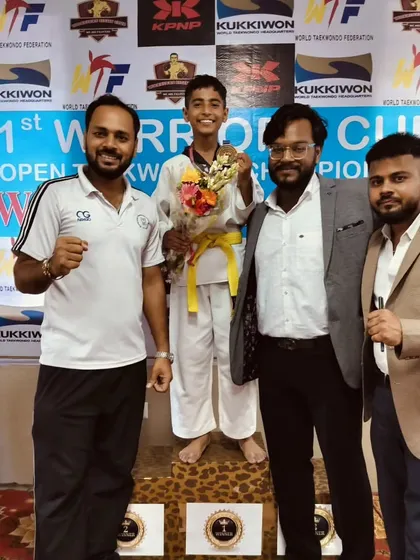 A proud moment for our yellow belt student on the winners' podium. We believe in giving opportunities to students at all belt levels.