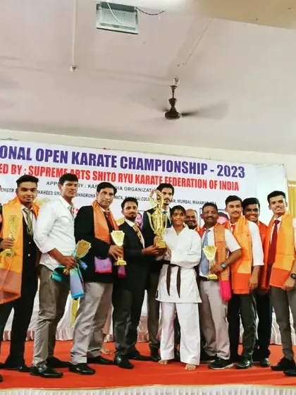 Our team celebrating Shifa's victory at the 1st National Open Karate Championship. This win is a collective effort of her dedication and the support of all the coaches and students at our dojo.