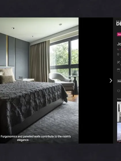 A screenshot from the Design Dekko feature on our Jor Bagh Residence, highlighting the custom furniture and paneled walls that contribute to the room's elegance.