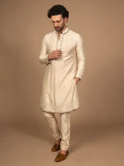 Style passed down like a story. This classic ivory kurta features delicate embroidery along the neckline and hem. It’s a timeless piece that isn’t just worn, it’s inherited, because tradition never fades, it evolves.