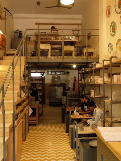 Our Nehru Place studio features a multi-level layout, with wheels downstairs and a hand-building area on the mezzanine.