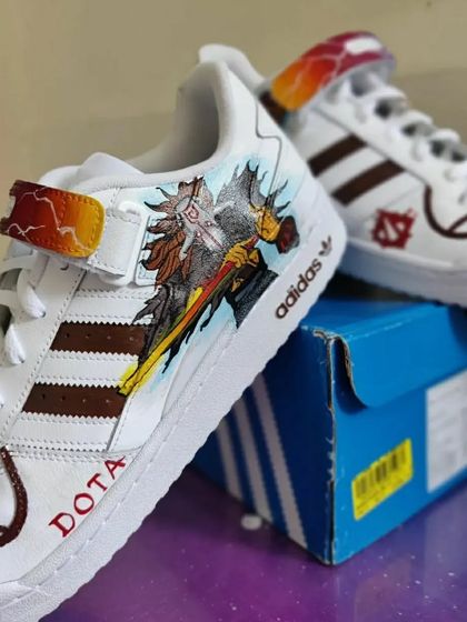 A custom pair of Adidas Forums for a DOTA fan, featuring a character from the game.