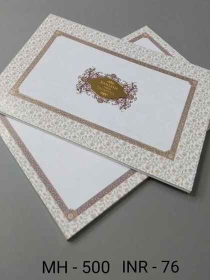 A classic invitation with a simple floral border and a central nameplate. The design is clean, timeless, and suitable for any formal occasion.