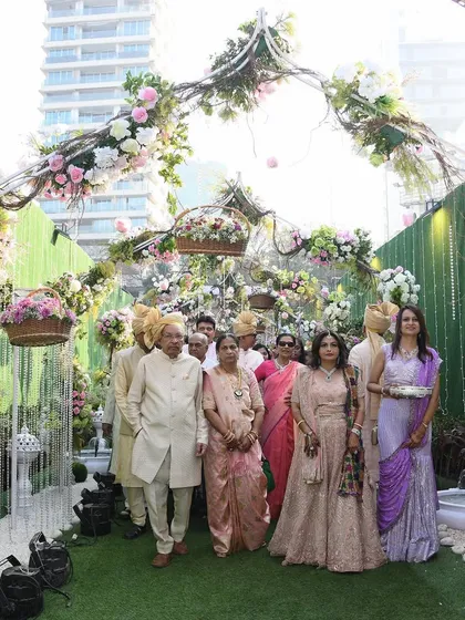 A beautiful family portrait taken in the elegant walkway of the wedding venue. We help coordinate these important photo opportunities.