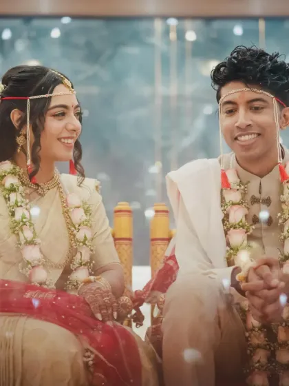 The couple during their wedding ceremony. Sonia's look is a testament to the beauty of simplicity and tradition.