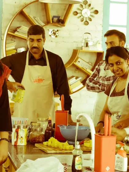 A lively discussion around the cooking station. Our workshops are designed to be interactive, encouraging communication and problem-solving in a fun, relaxed environment.