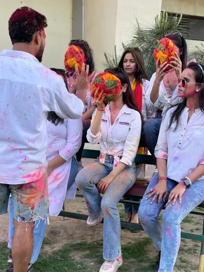 A playful moment during our Holi 2024 celebration at the Noida Stadium.