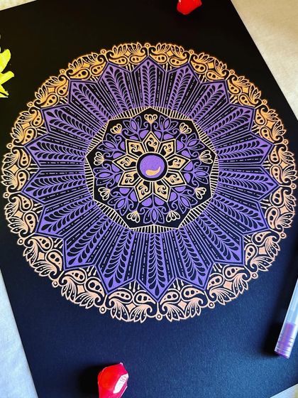 Another look at this purple and orange Gelly Roll mandala. The fine lines and patterns show the precision you can achieve with these pens.