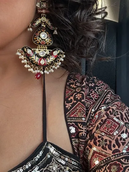 A detail shot of the stunning earrings I wore with my Ajrakh lehenga. When styling for weddings, I believe statement jewelry is essential to elevate your look.
