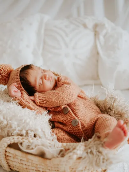 Sleeping soundly, dreaming sweet dreams. This side profile is a beautiful way to capture her peaceful state.