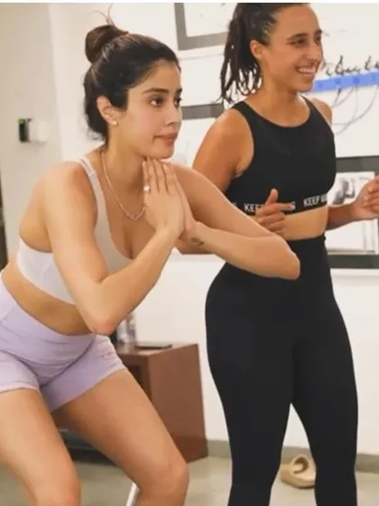 In the heart of Bollywood, we are privileged to train the industry's finest. Here I am guiding Janhvi Kapoor through a squat, focusing on form and control to maintain her incredible energy and physique.