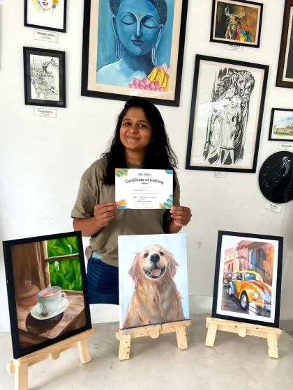 This student's oil paintings show a great understanding of color and light, from the warm coffee cup to the expressive dog portrait.