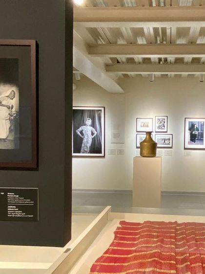 A glimpse into one of the exhibition spaces at the Museum of Art and Photography (MAP). The layout uses partial walls and varied display methods to create a dynamic journey through the gallery, with new discoveries around every corner.