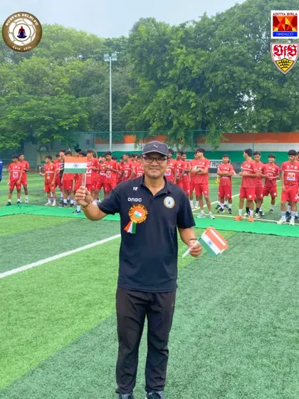 A coach proudly holding the Indian flag. At Sudeva, every day is about working towards making our nation proud.