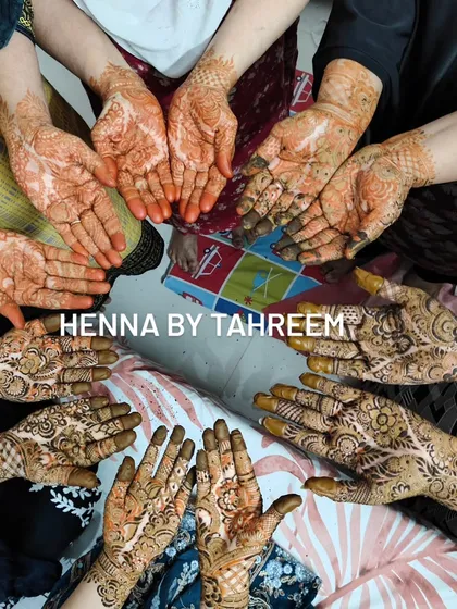 A beautiful circle of hands, each with a unique henna design. This photo captures the joy and community of a mehendi celebration, and I'm so grateful to be a part of these moments.