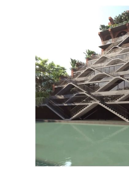 A rendering of 'Sanskriti Vihara' showing the stepped facade and pool. The design is a return to our glorious past, reinterpreted for modern learning.