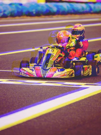 A father and son duo share a moment on track. We support families and create memories that go beyond the racetrack.