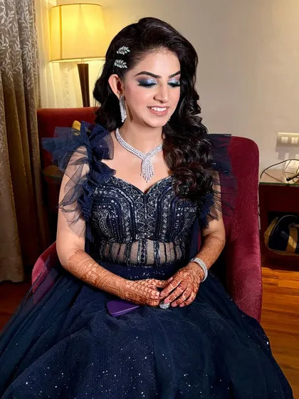 Aditi looking happy and beautiful. The sparkling blue eyeshadow catches the light perfectly in this shot.