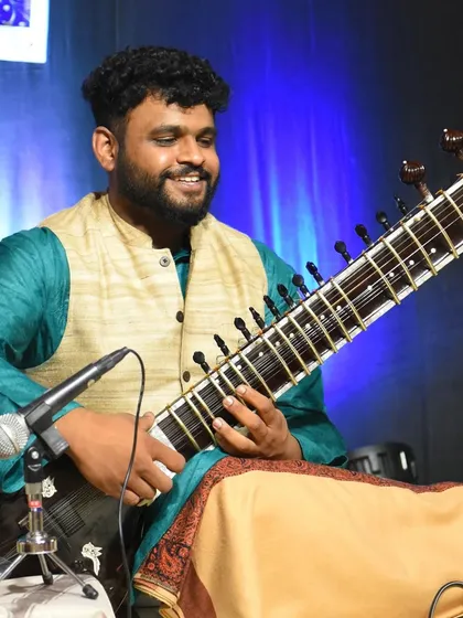 A candid smile during a concert. I believe music should bring joy, both to the listener and the performer.