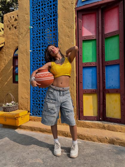 Another variation with the matka, showing a different angle and expression.