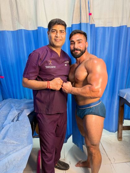 Posing with professional athlete Raj Faujdar.