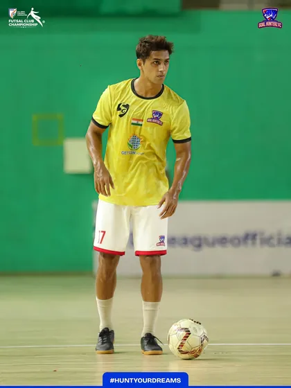 A player looking composed with the ball at his feet during warm-ups.