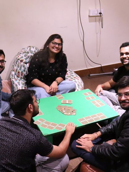 Our bean bag area is a popular spot for a relaxed game of cards. It's all about comfort and good company here.
