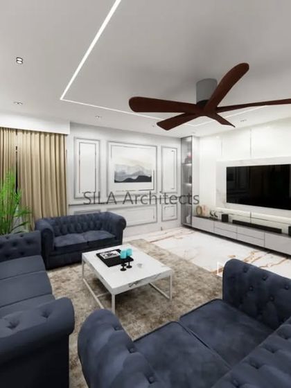 Another angle of the living room render, showing the deep blue sofas and elegant wall paneling, designed to create a classic yet contemporary feel.