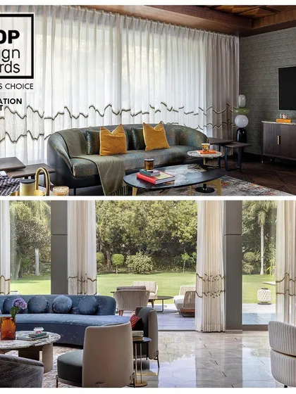 This award-winning renovation project, recognized by the Loop Design Awards, transforms a dated space into a modern haven. The custom embroidered curtains add a unique, flowing design element that connects the room to the nature outside.