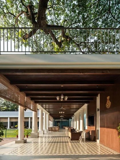 At the historic Bangalore Club, I designed a new colonnade to respect and enhance the 100-year-old heritage buildings. The structure provides elegant seating overlooking the main lawn, using traditional materials like heritage tiles and local Sadharhalli stone to blend seamlessly with the club's timeless character.