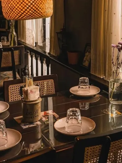 Seeing my work in its environment is the best part of what I do. These custom caddies and plates are pictured here at a restaurant, fully integrated into the dining experience I helped create.