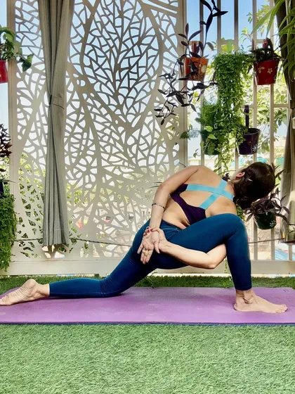 A bound low lunge, this pose deeply stretches the hips and quadriceps. It reflects the invincible summer within us, a source of strength we can find even in the depth of winter.