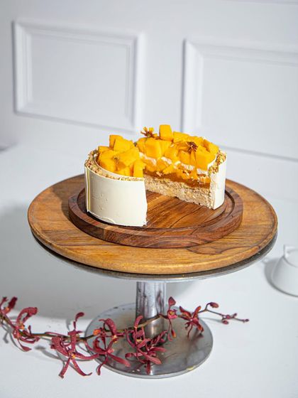 Haven't you heard it's all about the layering? Our mango cake with a slice taken out to reveal the delicious interior.